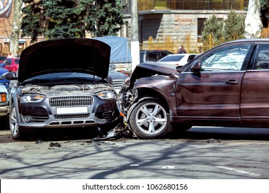 Collision Of Two Cars, The Crossover Moved Into The Side Of The Car.