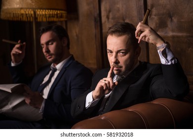 Collusion In Business And Global Conspiracy Between Two Successful Businessmen While They Are Spending Time In Men's Club And Solving Global Problems.