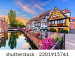 Colmar, Alsace, France. Petite Venice, water canal and traditional half timbered houses.