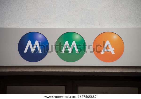 Colmar - France - 26 January\
2020 - Closeup of MMa logo on insurance agency facade in the\
street