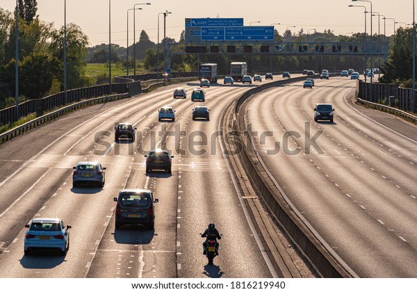 COLNEY\
STREET, UK - SEPTEMBER 13, 2020: Afternoon traffic on busiest\
British motorway M25 near to town Colney\
Street.