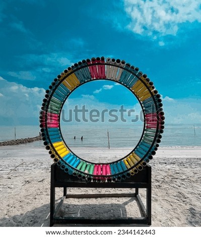 A coloful of cirlcle on the beach