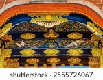 Coloful Ornate Entrance Closeup Karamon Gate Nijo Castle Kyoto Japan. Completed in 1626 by Tokugawa Shoguns. In 1867 Castle returned to Emperor. Chrysanthemum is a symbol of Imperial Court.