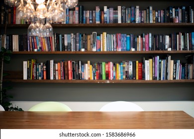 Coloful Wall With Many Books On Book Shelves In A Modern Living Room Blurred, Retro Interior Beauty