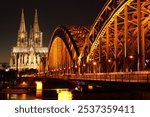 Cologne Cathedral with hohenzollern bridge night view