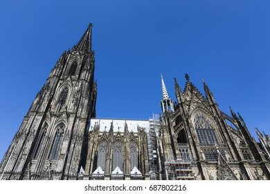Cologne Cathedral low angle view from the side with blue sky