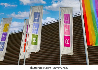 Cologne (Deutz Rheinhallen), Germany - July 9. 2022: German RTL Television Group Headquarter, Blue Summer Sky With Fluffy Clouds 