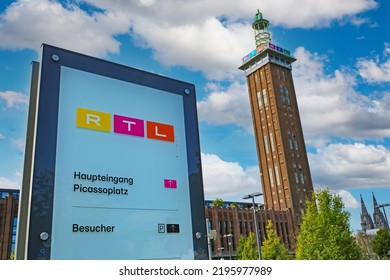 Cologne (Deutz Rheinhallen), Germany - July 9. 2022: German RTL Television Group Headquarter, Blue Summer Sky With Fluffy Clouds 