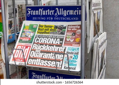 Cologne, Germany - February 17th 2020: Copies of the Bild Koln newspaper in Germany - with the the headline - Coronavirus Returnees Released from Quarantine, pictured in the city of Cologne, Germany.