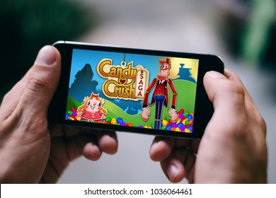 COLOGNE, GERMANY - FEBRUARY 27, 2018: Candy Crush Saga App Game Played On Apple IPhone