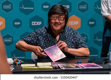 COLOGNE, GERMANY - JUN 28th 2019: Benedict Wong (*1971, British Chinese Actor) Signing Autographs For Fans At CCXP Cologne, A Four Day Fan Convention