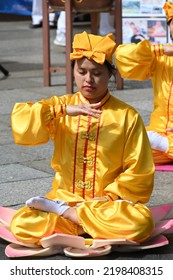 Cologne, Germany - June 25, 2022: Members Of The Falun Gong Religion Demonstrate Against Their Oppression In China