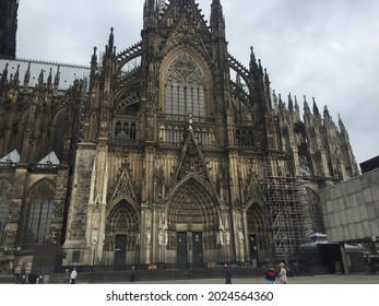 COLOGNE, GERMANY - Mar 20, 2018: A Tourist visiting the most famous church in Koln called the Koln Cathedral church