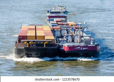 Cologne, Germany - May 5 2016: Cargo Ship ST. ANTONIUS II (ENI 02332893, Built In 2010) As Pusher Train With A Barge Towed Alongside On The River Rhine I