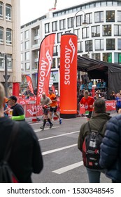 Cologne, Germany - October 13 2019: Marathon Runners Passing The Friesenplatz At Cologne Marathon 2019