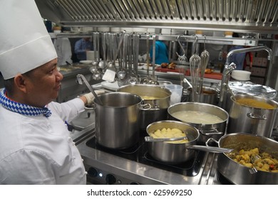 COLOGNE, GERMANY - SEP 15, 2016 - Chef Supervises The Kitchen Of A River Cruise Ship, Germany