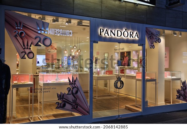 COLOGNE, GERMANY -\
SEPTEMBER 21, 2020: Pandora jewelry store in Hohe Strasse (High\
Street) of Cologne, Germany. Hohe Strasse is one of busiest\
shopping destinations in\
Germany.