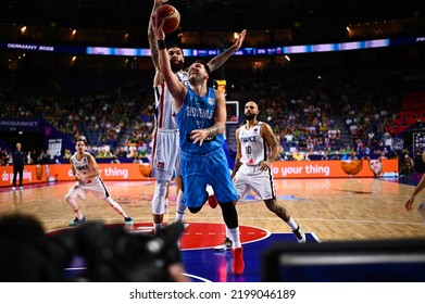 COLOGNE, GERMANY - SEPTEMBER 7, 2022: Luka Doncic Vs Vincent Poirier. The Basketball Match Of Eurobasket 2022 France Vs Slovenia