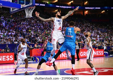 COLOGNE, GERMANY - SEPTEMBER 7, 2022: Vincent Poirier, Luka Doncic. The Basketball Match Of Eurobasket 2022 France Vs Slovenia