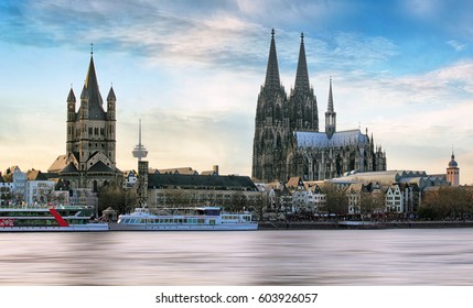 Cologne Over The Rhine River With Cruise Ship In Cologne, Germany.