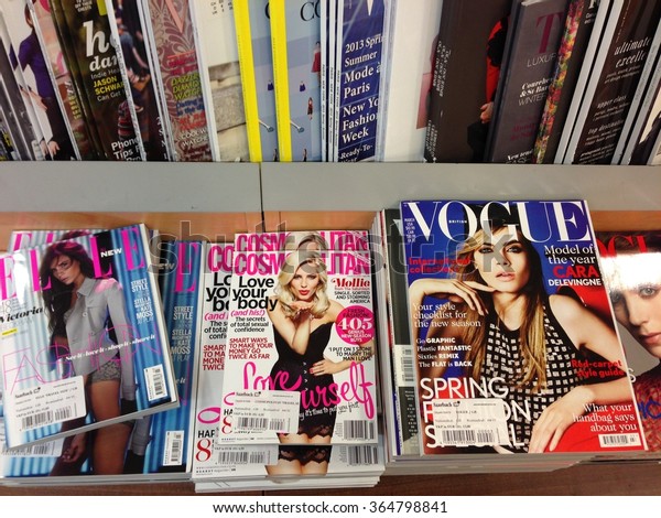Cologne,Germany-\
February 23,2013: Popular british magazines in english language on\
display in a store in\
Cologne,Germany