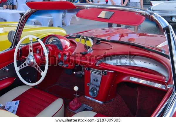 Cologne,Germany,08,06,2022- red chevrolet\
corvette convertible classic c1 from the sixties at the classic car\
show in cologne,  view of the\
interior