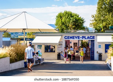 Cologny, Switzerland - September 5, 2020: People Going To Geneve-Plage, A Nautical Base And Leisure Center In A Park On The Shore Of The Lake Geneva With Beach, Swimming Pools And Windsurfing Center.