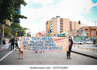 BOGOTÁ, COLOMBIA - 12 MAY, 2021: Cartel Against The Politic Movement Uribismo In A Protest In The Framework Of The Colombian National Strike Against Ivan Duque Government 