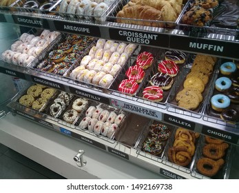 Bogotá, Colombia: 17th May 2019: Shop Window Of Dunkin'Donuts. Lots Of Different Donut Flavours Are Exposed, Including Local Ones Such As Arequipe.