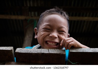 Vaupés, Colombia. 23-01-2019. Portrait Of A Happy Indigenous Boy Smilling