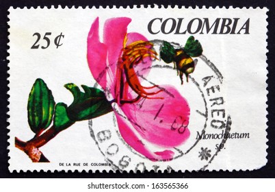 COLOMBIA - CIRCA 1967: a stamp printed in the Colombia shows Monochaetum Orchid and Bee, circa 1967