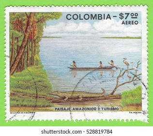 COLOMBIA - CIRCA 1979: A stamp printed in colombia shows Amazonian Landscape Tourism