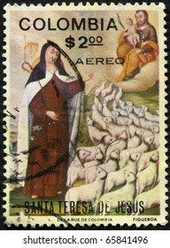 COLOMBIA - CIRCA 1980-s: A greeting Christmas stamp printed in Colombia shows paint by Santa Teresa de Jesus, circa 1980-s