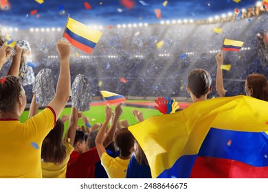 Colombia football supporter on stadium. Colombian fans on soccer pitch watching team play. Group of supporters with flag and national jersey cheering for Colombia. Championship game. - Powered by Shutterstock