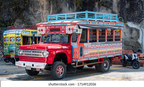 Guatapé, Colombia - March 23rd 2020: Typical Transportation Trucks Decorated And Painted With Beautiful Colors. Culture And Transport In Colombia Guatapé.