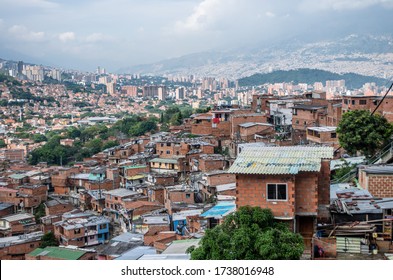 Medellín, Colombia - May 09, 2017: 
Medellín Slums, Colombian Slum, Medellin Cartel, Beautiful View On The Communa 13 Neighborhood, Outstanding House, Cityscape In Colombia, Hillside Barrio