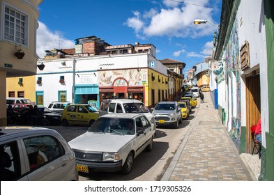 Bogotá, Colombia - May 4, 2017: Traffic Jam, Car Traffic In The Streets Of Bogota, Colombia, Roads Full Of Cars, Polluted City, Art District With Graffiti, Taxi Drivers