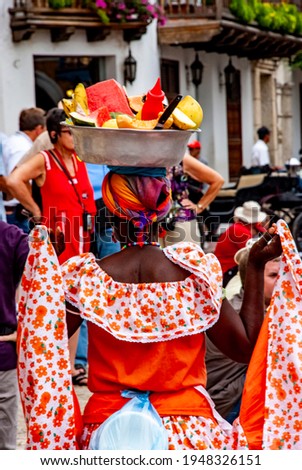 Similar – Image, Stock Photo Colombian woman selling traditional Guarapo in bottles