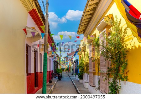Colombia, Scenic colorful streets of Cartagena in historic Getsemani district near Walled City, Ciudad Amurallada, a UNESCO world heritage site.