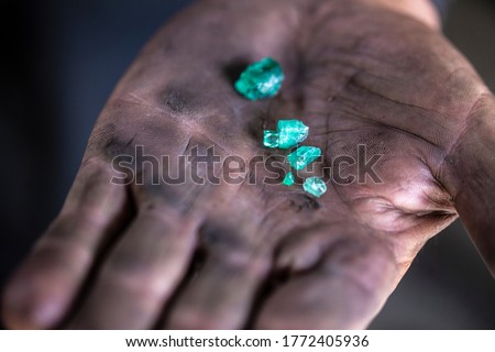 Colombian emerald miners in Muzo, Boyaca in the Santander department of Colombia. It is estimated that Colombia accounts for 70-90% of the world's emerald market. 