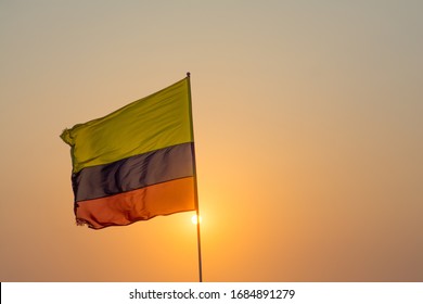 Colombian Flag Waving With Sunset