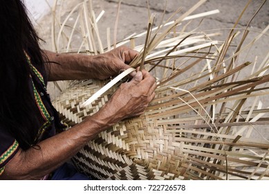 Colombian Woman Making A Basket