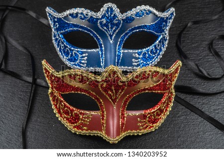 The Colombina, red, blue carnival or masquerade mask.