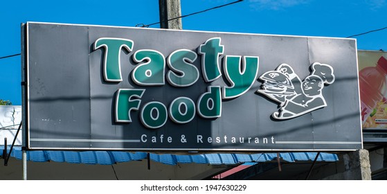 Colombo, Sri Lanka - 03 30 2021: Tasty Food Restaurant And Café Name Board Above The Building.