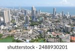 colombo, sri lanka areal city view from helicopter or drone with buildings and sea and beira lake.