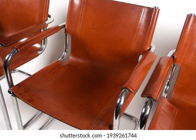 Colombo Tan Leather And Chrome Armchairs Designed By Marcel Breuer On A White Background