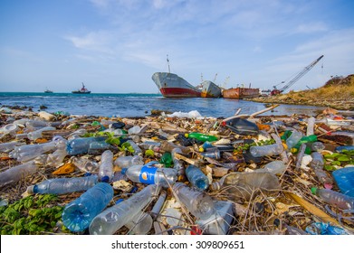 COLON, PANAMA - APRIL 15, 2015: Enviromental Pollution washing ashore next to the Panama Canal in the beach