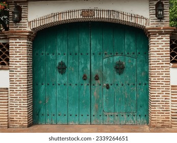 Colonial architecture, green door and colonial house - Shutterstock ID 2339264651