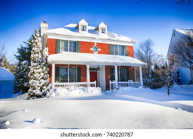 A Colonial Home In Southern New Jersey Covered In Fresh Snow.