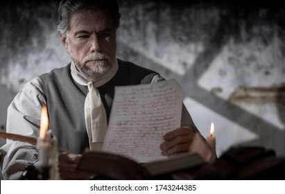 Colonial Man Reading A Document During The 1776 American Revolutionary War